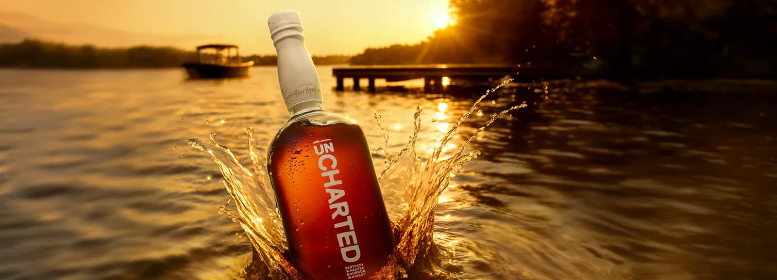 O.H. Ingram Uncharted bottle in the river at sunset